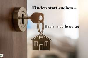 Wohn-/Geschäftshaus und 2-Familienhaus