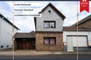 Einfamilienhaus mit Einliegerwohnung || 
2 Grundstücke || vermietet