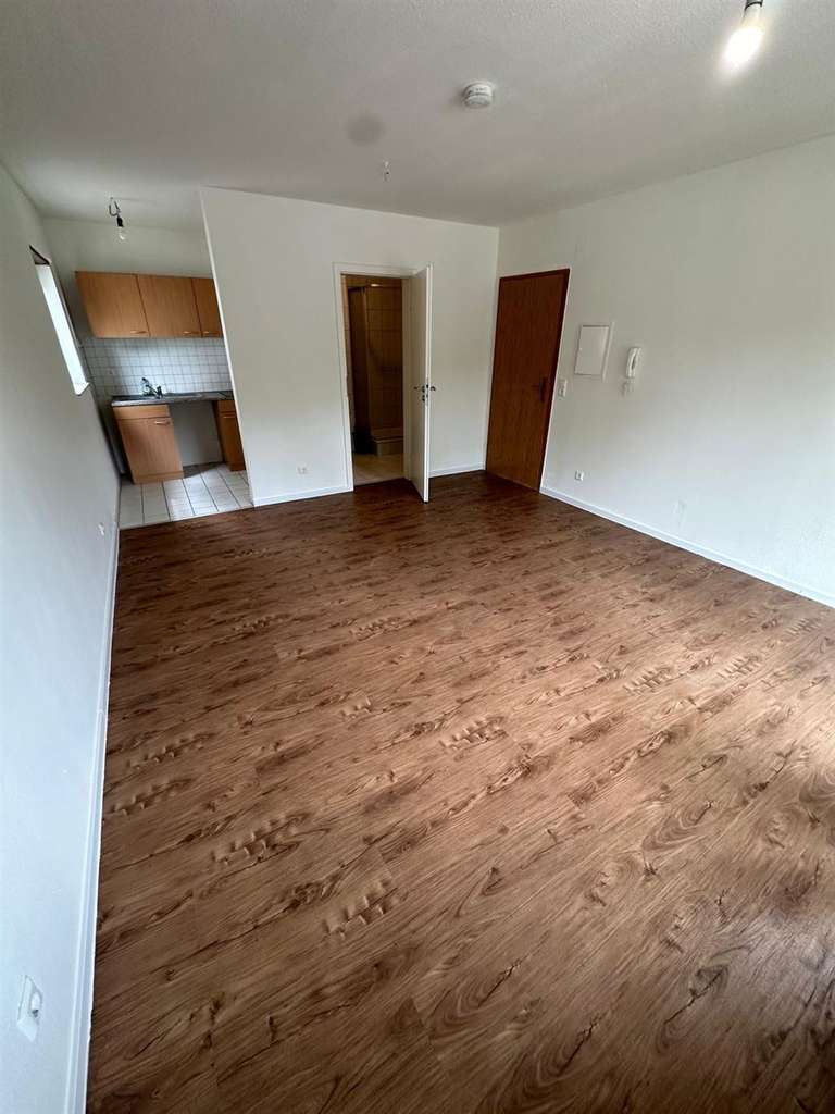 Immobilie in Nußloch - Helle 1-Zimmerwohnung in zentraler Verkehrslage von Nußloch... - Bild 1