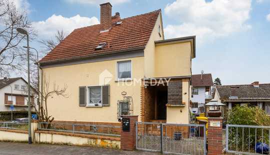 Bild von Einfamilienhaus mit Wintergarten, Garage und großem Garten in ruhiger Lage