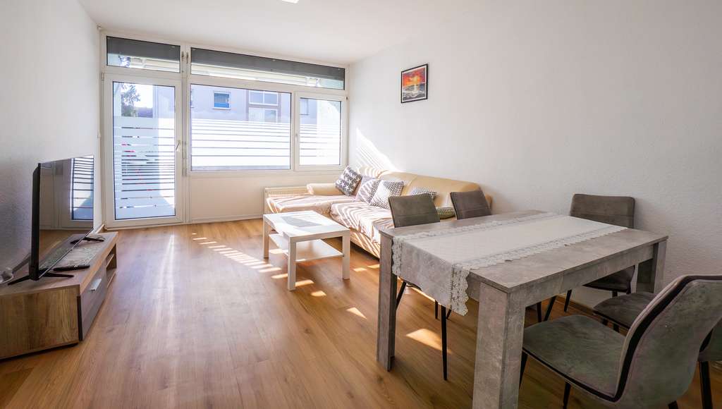 Immobilie in Oftersheim - Kapitalanlage oder Selbstnutzung?   Geräumige 3 Zimmer-ETW mit   Loggia in Oftersheim / Schwetzingen - Bild 1