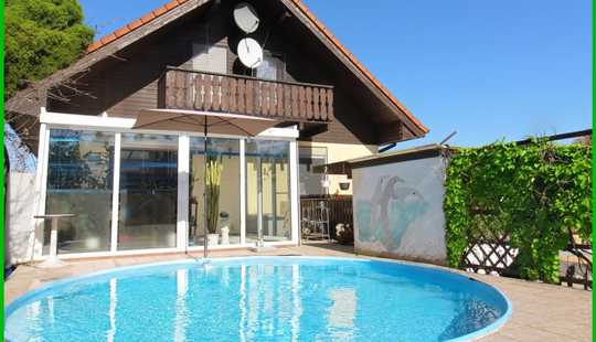 Bild von Wohntraum mit Pool und Wintergarten