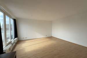 Komfortable 1-Zimmer-Wohnung mit Dachterrasse und Einbauküche