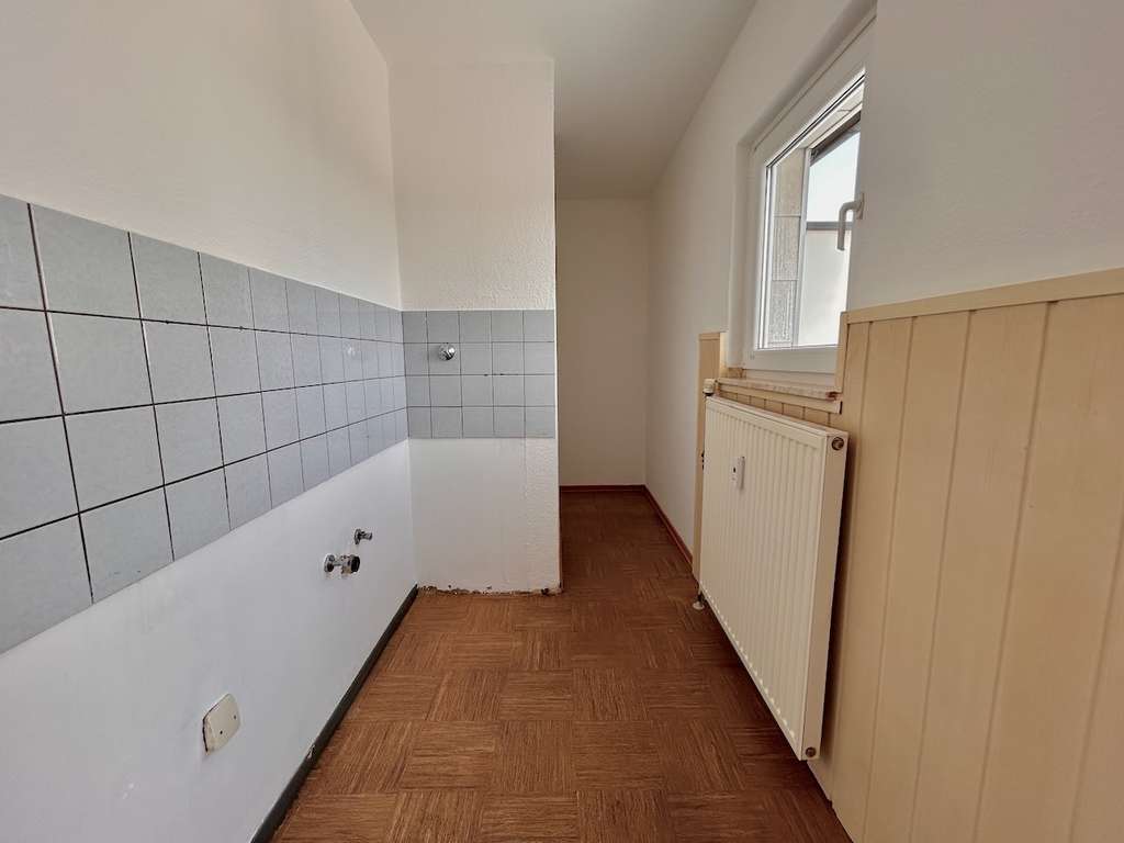 Immobilie in Neuss - Kompakte Dachgeschosswohnung mit großer Sonnen-Loggia und Weitblick - Bild 3