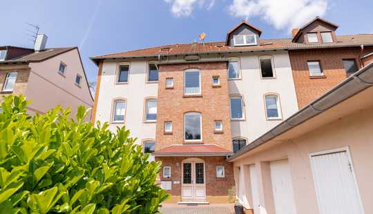 Bild von Aufgeteiltes Mehrfamilienhaus mit 8 Wohneinheiten und Garagen