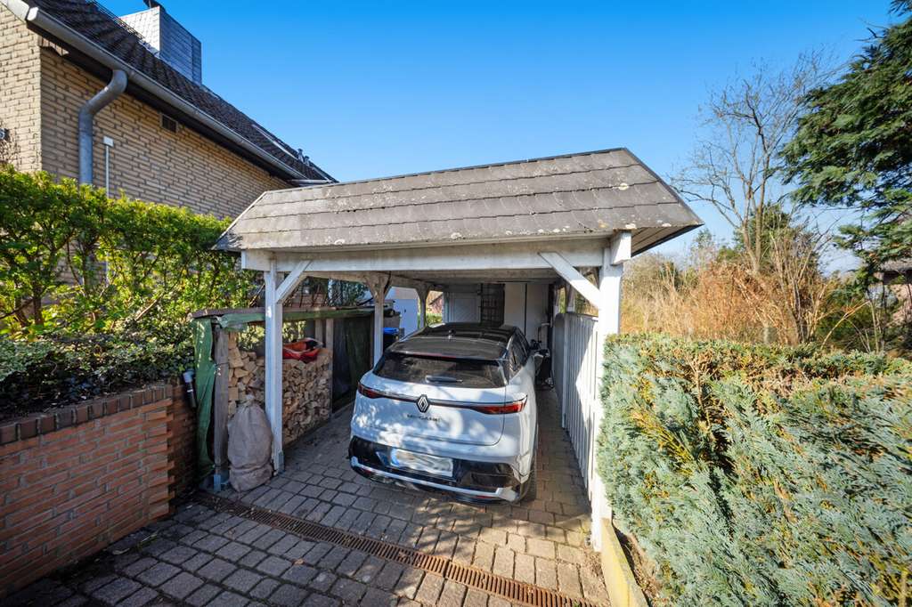 Immobilie in Eutin - Einfamilienhaus mit Einliegerwohnung, PV-Anlage und Süd-West-Garten - Bild 3