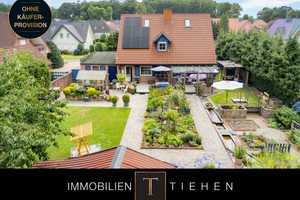 Modern aufgeladen: Einfamilienhaus mit 2 PV-Anlagen, neuer Wärmepumpe und Freiluftwohnzimmer – Emsland (Kreis) – Vorschaubild 1