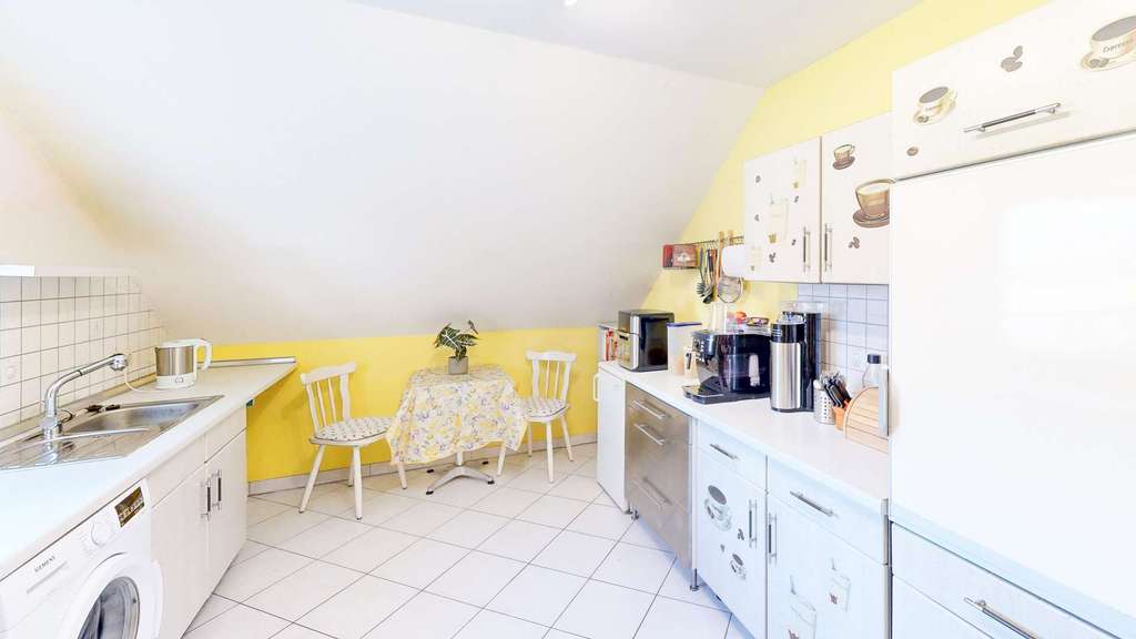 Immobilie in Margetshöchheim - Charmante Dachgeschosswohnung mit viel Stauraum - Bild 3