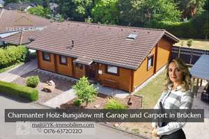 Kleines Haus, großes Lebensgefühl – Holz-Bungalow mit Südterrasse, Garage & Carport
