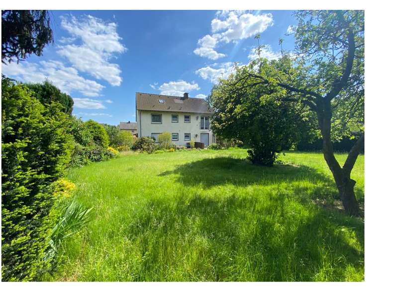 Freistehendes 2-Familienhaus mit 2 Garagen & Traumgarten in bester Lage von Marl-Hüls