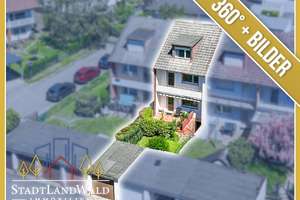Reihenmittelhaus mit kleinem Garten, Garage und solider Substanz in ruhiger Lage