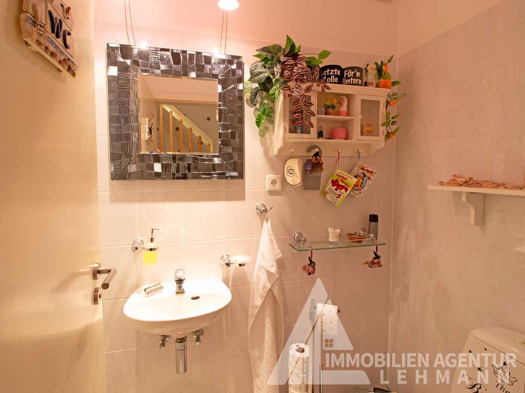 Immobilie in Rüdnitz - Solides Reihenhaus mit Terrasse, Garten und Fernwärme - Bild 3