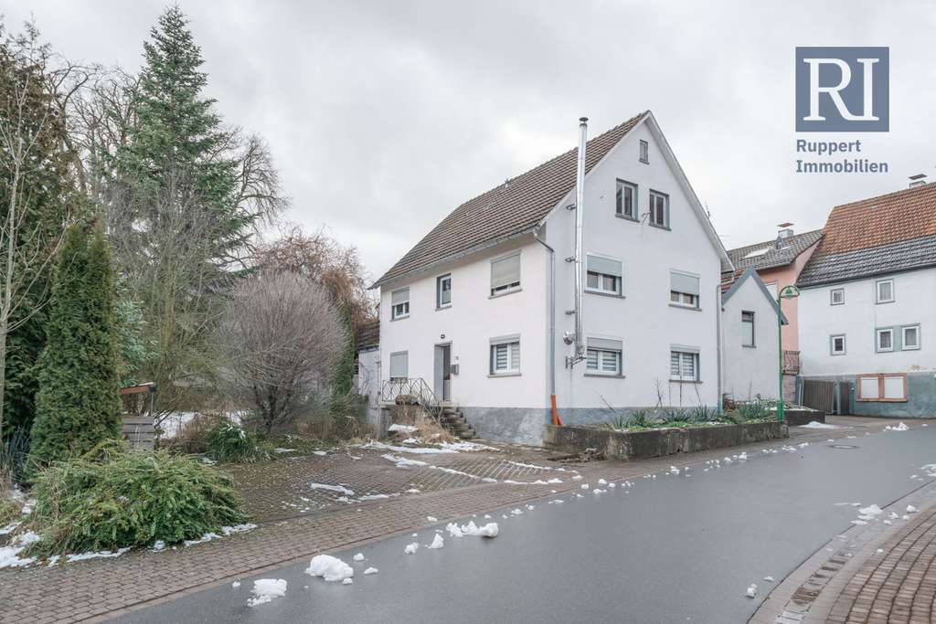 Immobilie in Külsheim - Einfamilienhaus mit großzügigen Eckgrundstück - Bild 1
