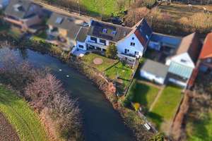 WOHNBAU: Wohnen am Wasser: Einfamilienhaus mit privatem Erft-Zugang - unvergessliche Kanu-Abenteuer – Die vollständige Adresse der Immobilie erhältst du vom Anbieter., 41516 Grevenbroich – Vorschaubild 1