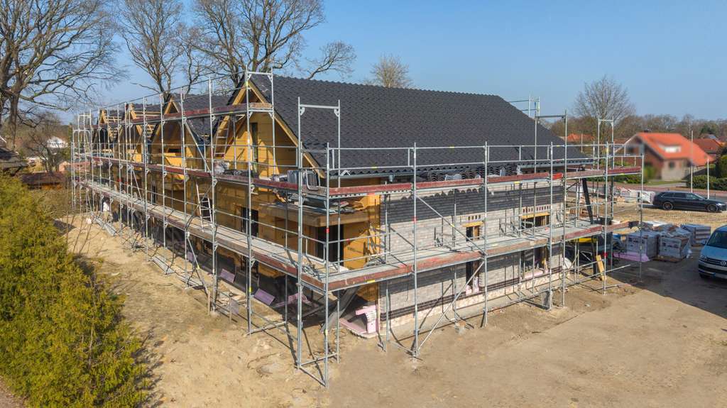 Immobilie in Friedeburg - Projektierte Dachgeschosswohnung KfW 40 mit Wärmepumpe und PV Anlage in zentraler Lage - Bild 3