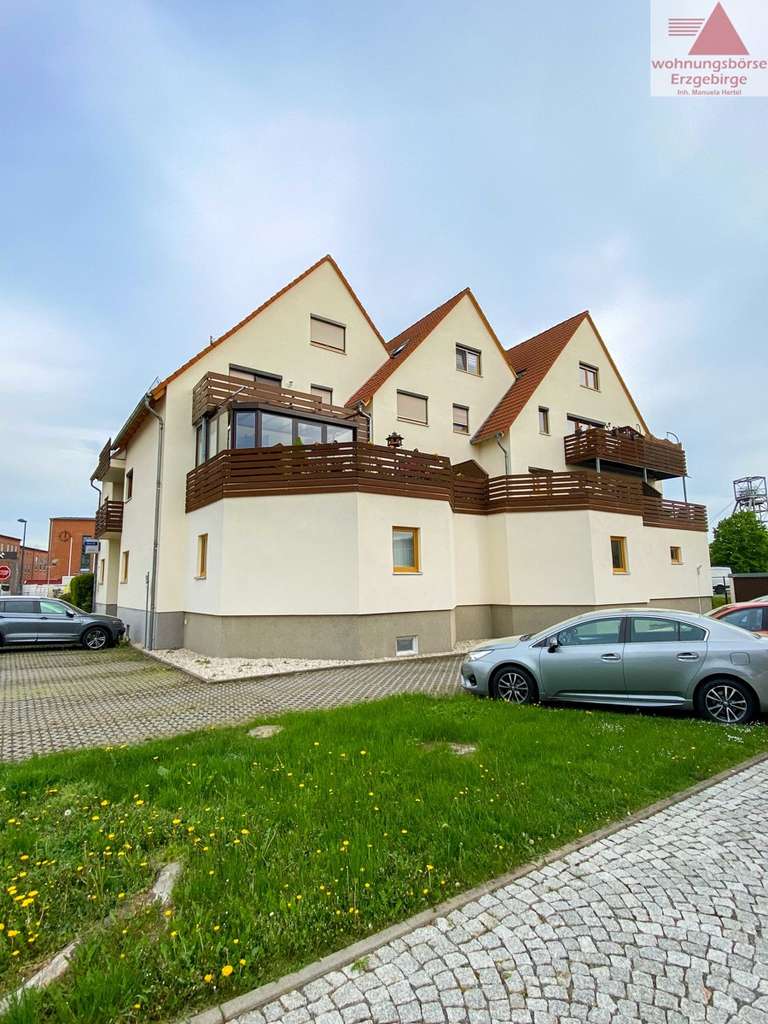 Immobilie in Oelsnitz/Erzgeb. - Vermietete Eigentumswohnung mit Balkon und Stellplatz in zentraler Lage von Oelsnitz nahe Stollberg - Bild 2