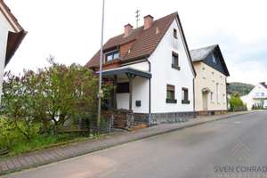 Direkt einziehen! Schönes Einfamilienhaus in Höhenlage von Fischbach – Die vollständige Adresse der Immobilie erhältst du vom Anbieter., 55743 Fischbach – Vorschaubild 1