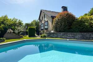 Stilvolles Einfamilienhaus mit Traumgarten und Pool
