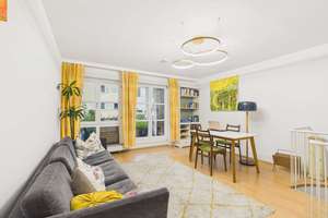HEGERICH:Großzügige 2,5-Zimmer-Maisonette in München-Sendling-Westpark mit Souterrain & Südostbalkon
