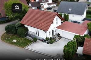 Lichtdurchflutetes Einfamilienhaus mit Wintergarten, Kamin und Doppelgarage in ruhiger Wohnlage