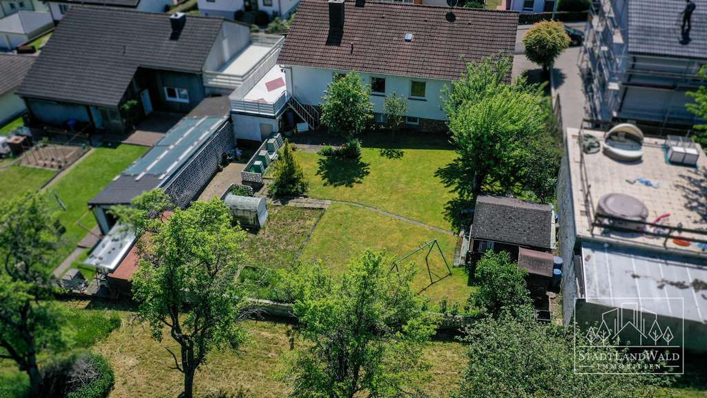 Immobilie in Höheischweiler - Einziehen und wohlfühlen – Gepflegtes Einfamilienwohnhaus mit Sonnenterrasse und Blick ins Grüne - Bild 4