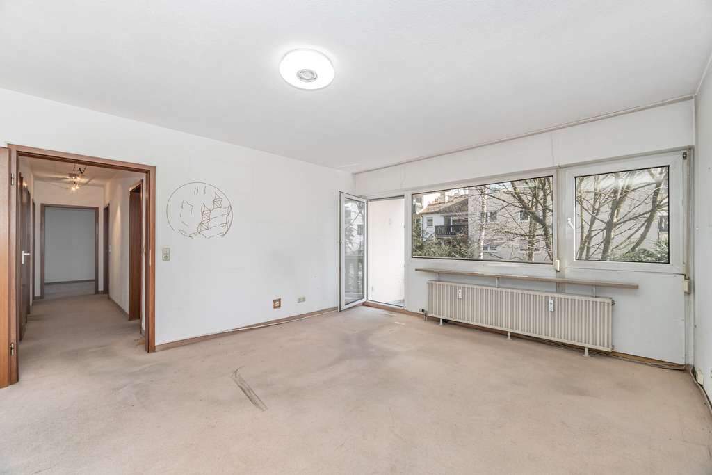 Immobilie in Ismaning - 3-Zimmer-Wohnung mit Balkon in Isarnähe – ideal zum Renovieren - Bild 3