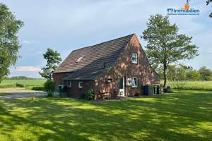 Einfamilienhaus im Grünen mit viel Grundstück – Die vollständige Adresse der Immobilie erhältst du vom Anbieter., 26553 Dornum – Vorschaubild 1