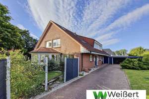 Exklusives Mehrgenerationshaus mit drei Wohneinheiten und 
450 m² Wohnfläche auf traumhaftem Grunds – Die vollständige Adresse der Immobilie erhältst du vom Anbieter., 25767 Tensbüttel-Röst – Vorschaubild 1