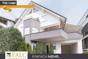 Modernisierte 3-Zimmer-Erdgeschosswohnung mit drei Terrassen, einer Garage und drei Stellplätzen