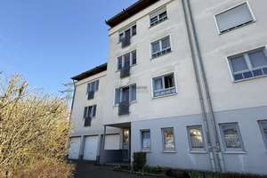 Gemütliche 2,5 - Zimmer Wohnung mit Balkon und Garage auf Erbpachtgrundstück!