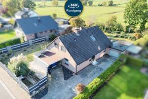 WOHNTRAUM MIT WEITBLICK IN BESTLAGE – EINFAMILIENHAUS MIT GARAGE, KAMIN UND NATURNAHER UMGEBUNG – Die vollständige Adresse der Immobilie erhältst du vom Anbieter., 26316 Varel – Vorschaubild 1