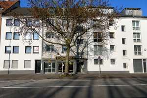 Attraktive Kapitalanlage: Wohn- und Geschäftshaus mit Gewerbeeinheit und 3 Garagen