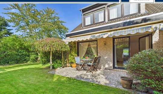 Bild von Gepflegtes Zuhause mit Gartenidylle – Reihenendhaus nahe Norddeich