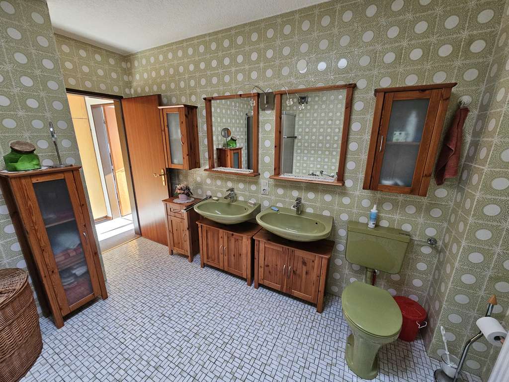 Immobilie in Langgöns - Viel Platz für den Alltag im Reihenmittelhaus in Langgöns - Bild 3