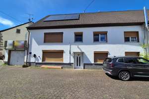 Zwei attraktive Wohneinheiten in historischem Dreiparteienhaus in Mettweiler