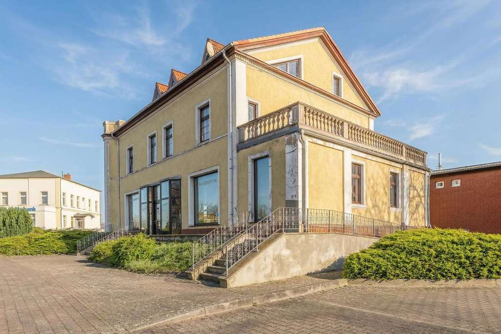 Immobilie in Neustadt (Dosse) - KENSINGTON - Exklusiv - Mehrfamilienhaus mit 4 Wohneinheiten und Gewerbe in bester Lage in Neustadt - Bild 3