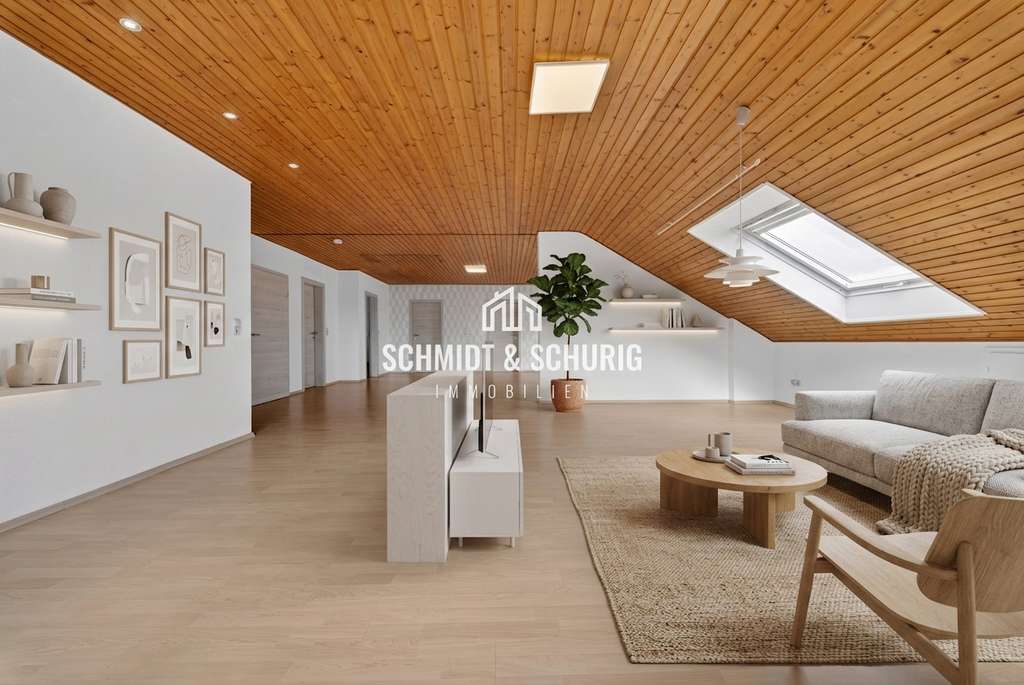 Immobilie in Oberhausen-Rheinhausen - Charmante Dachgeschosswohnung mit großer Garage und Gartenanteil - Bild 0