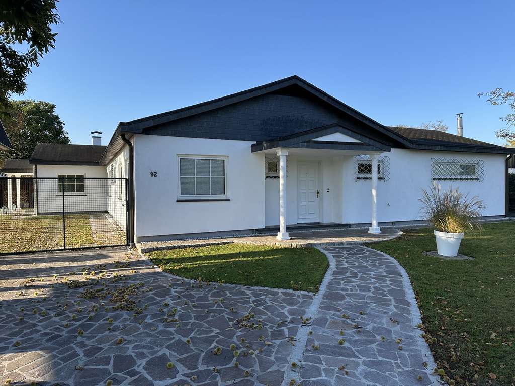 Immobilie in Ellerbek - Hochwertiger amerikanischer Bungalow in ruhiger Lage mit separater Einliegerwohnung - Bild 1