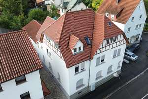 Gepflegtes 5-Familienhaus mit Garten und Entwicklungspotential