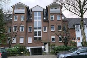 ETW im Hochpaterre mit eigenem Tiefgaragenstellplatz und großzügiger Dachterrasse