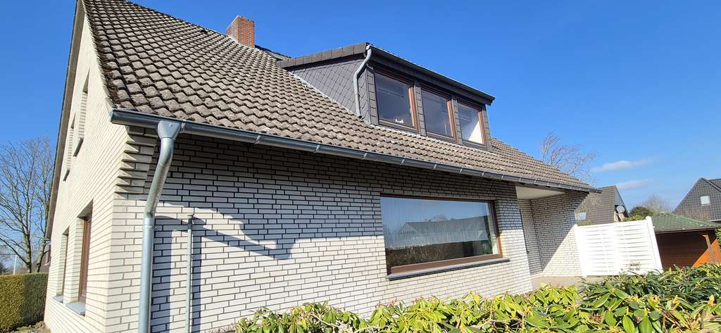 Immobilie in Sottrum - Zweifamilienhaus mit Doppelgarage und Keller im ruhigen Wohngebiet in Sottrum zu verkaufen - Bild 1