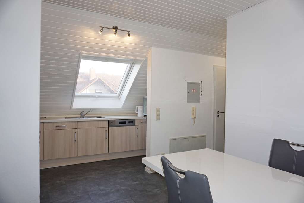 Immobilie in Bellheim - 3,5-Zimmer-Dachgeschosswohnung mit Balkon, Garage & Stellplatz in ruhiger Wohnlage - Bild 4