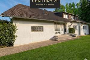 Mehrfamilienhaus mit parkähnlichem Grundstück und Bebauungspotenzial in ruhiger Ortsrandlage
