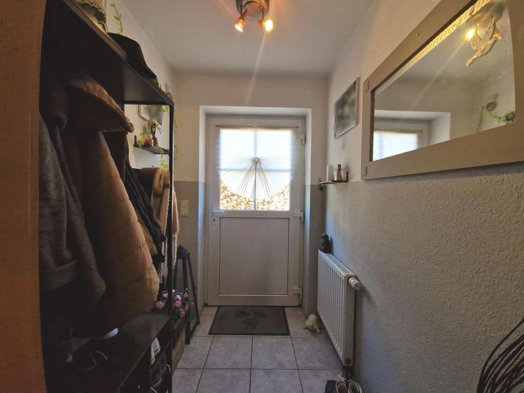 Immobilie in Jagel - Gepflegte sowie vermietete Doppelhaushälfte mit Carport und Terrasse in ruhiger Lage  - Bild 4