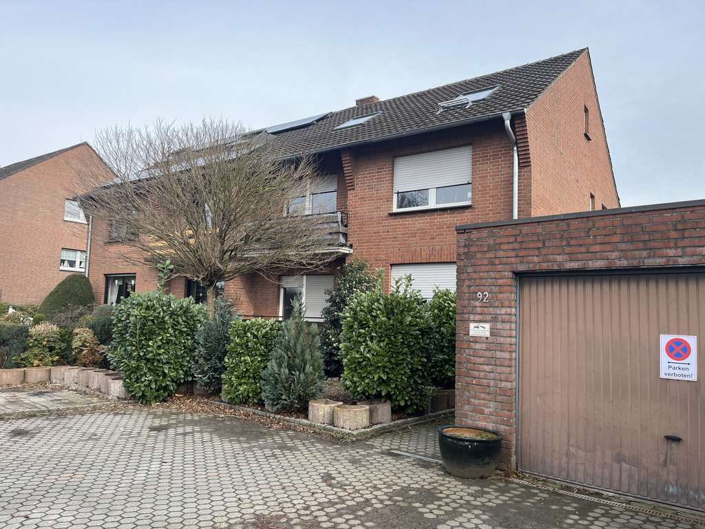 Immobilie in Xanten - Einladendes Einfamilienhaus mit Einliegerwohnung, Keller, Garage und Garten - Bild 1