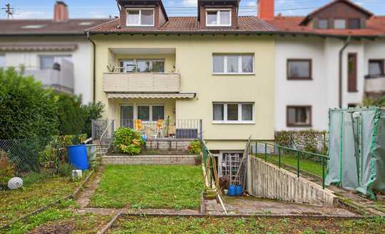 Viel Raum für Ideen: Attraktives Mehrfamilienhaus mit Garten und Werkstatt