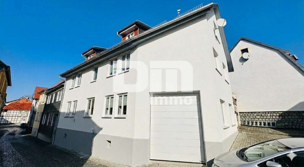 Immobilie in Dingelstädt - Vollständig kernsaniertes / neu erstelltes EFH in zentraler Lage mit 2 Garagen - Bild 1