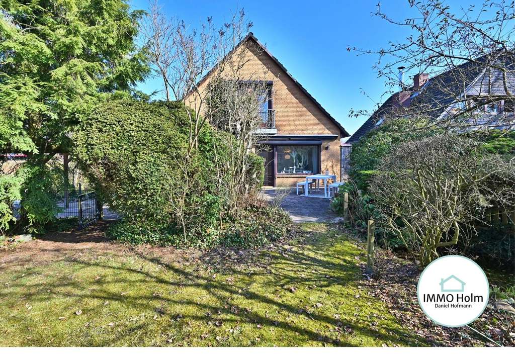 Immobilie in Wedel - Charmantes Einfamilienhaus in Wedel mit viel Platz und Potenzial - Bild 0