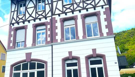 Bild von Mehrfamilienhaus mit Entwicklungspotenzial direkt am Rhein