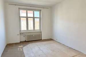 Sanierungsbedürftige 2,5-Zimmer-Wohnung inkl. 2 Tiefgaragenstellplätze  - in gefragter Lage